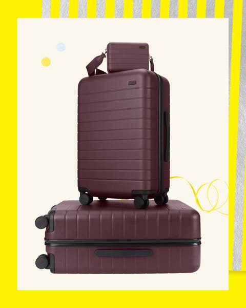 Wheeled luggage set in plum.