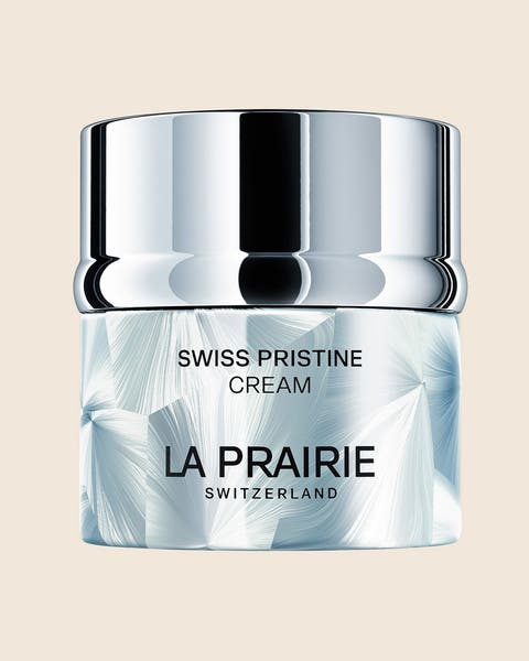 La Prairie Swiss Pristine Cream in a silver-capped jar.