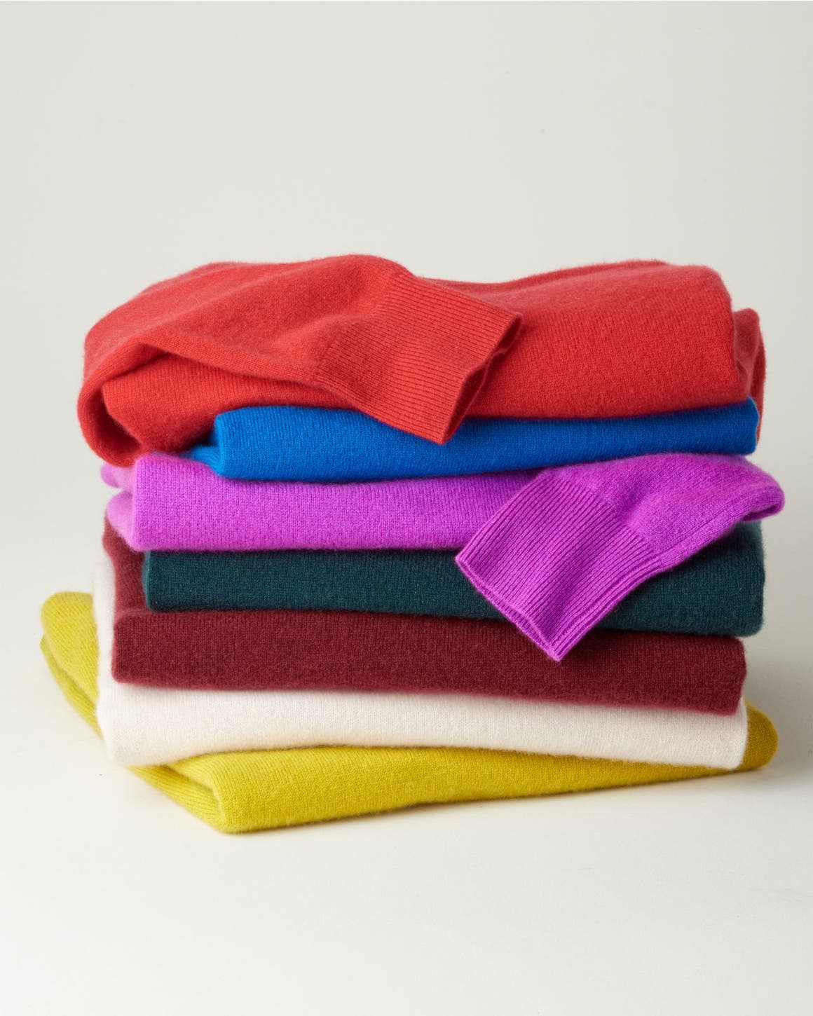 a stack of sweaters.