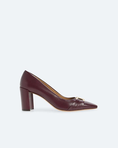 Dark leather block-heeled pumps.