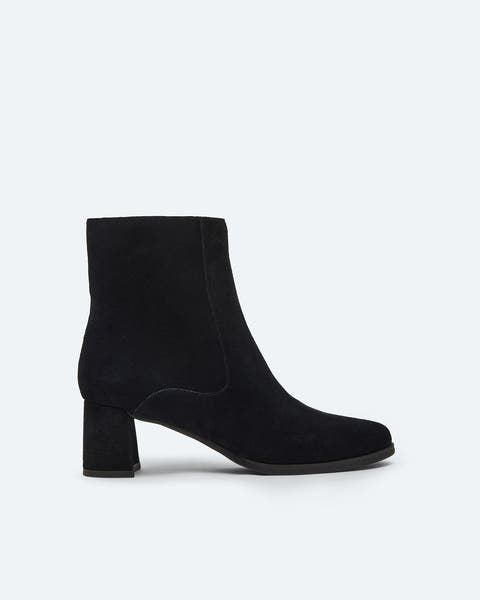 Black suede block-heeled booties.