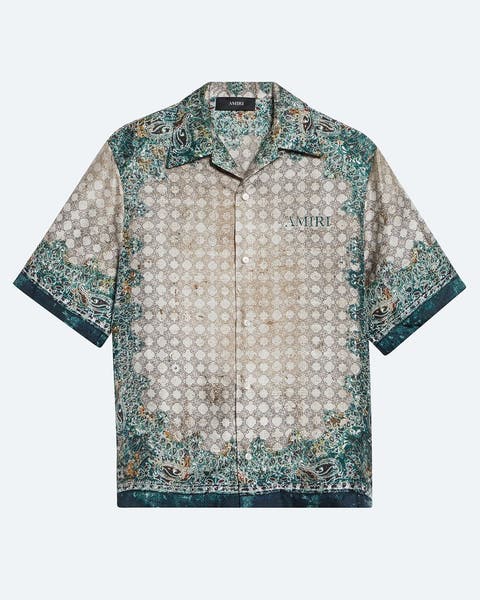 A patterned short-sleeve button-up shirt.