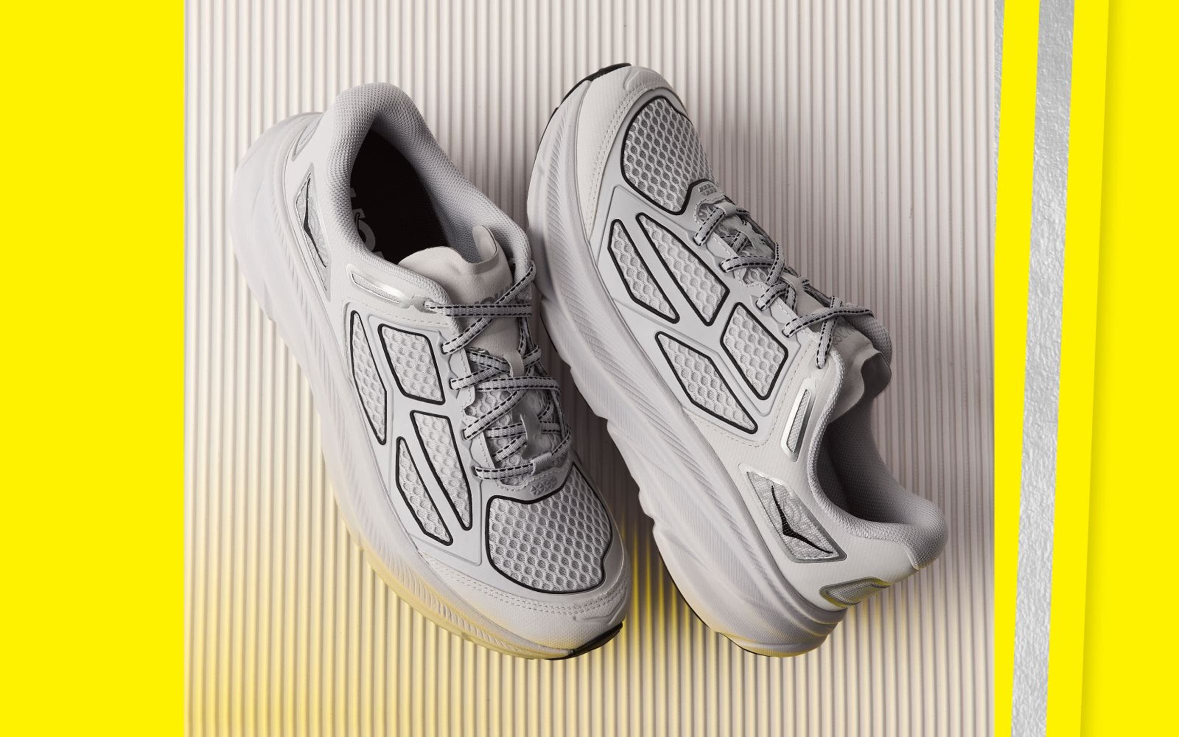 Men’s grey, white and black sneakers.