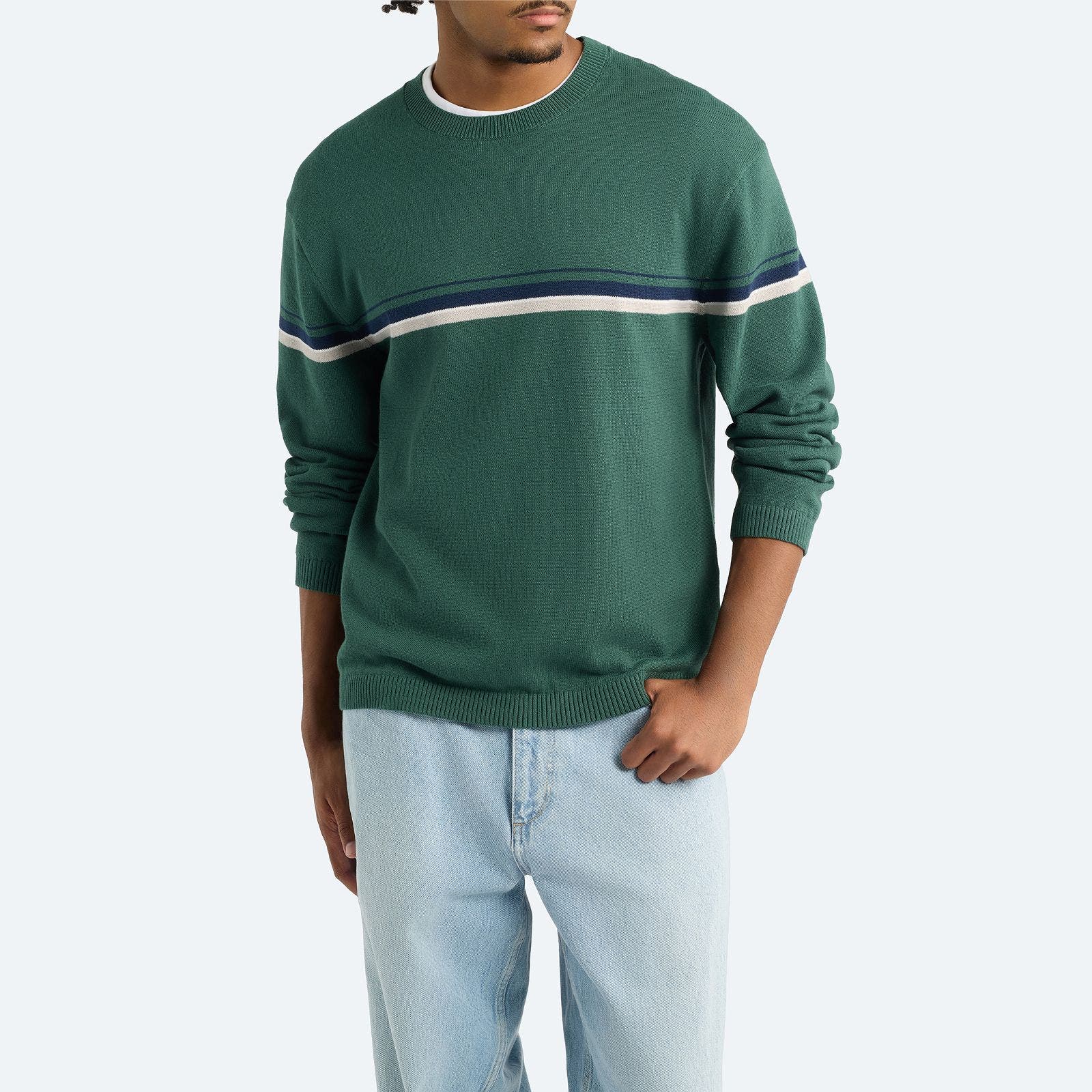 A man wearing green striped sweater.