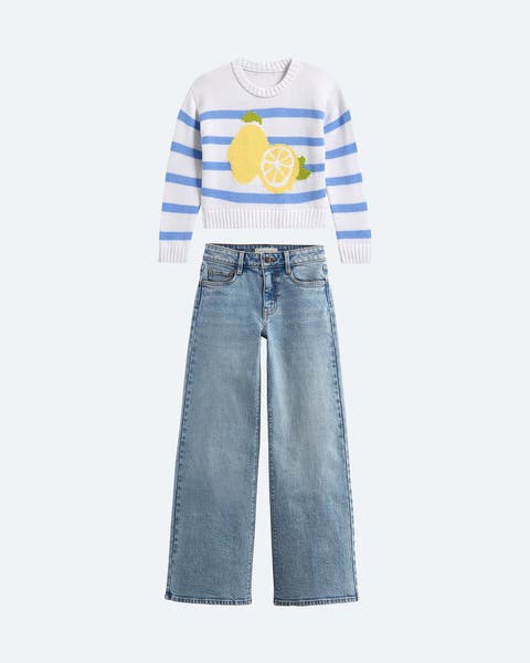 A blue and white striped knit with lemon print. Light wash, wide-leg jeans.