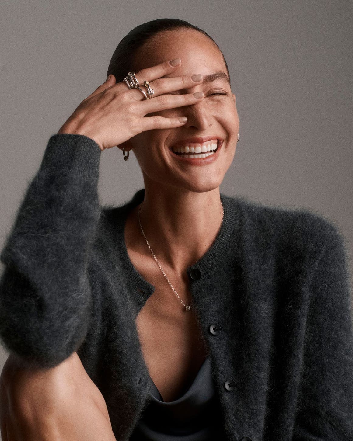 a women wearing luxe jewelry