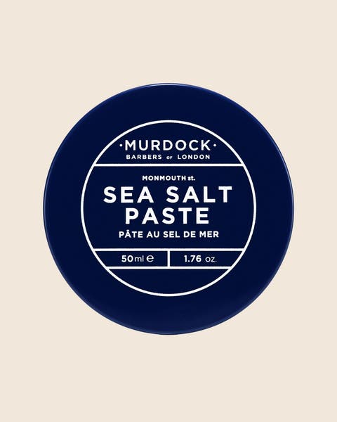 A Murdock London Sea Salt Paste tin with a navy lid and white lettering.