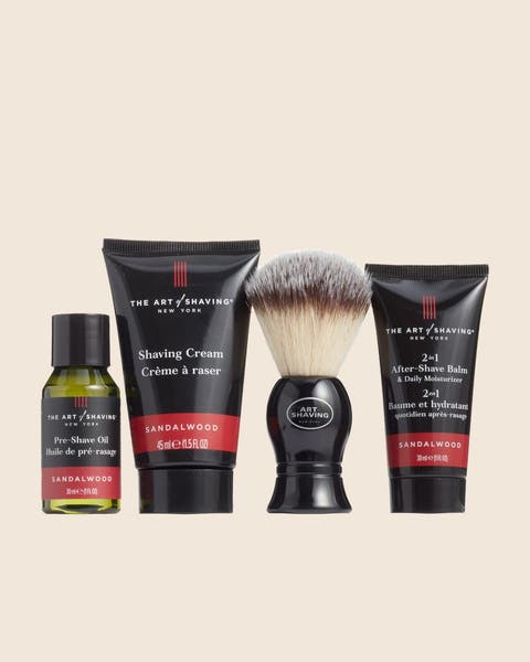 A four-piece The Art of Shaving set with a shave brush, cream, oil and after-shave balm.