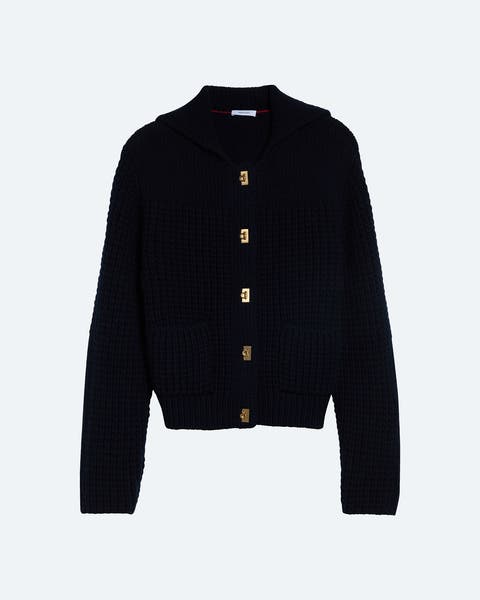 Navy knit cardigan with a collared neckline, gold-tone decorative buttons, long sleeves, ribbed cuffs and hem, and two patch pockets at the hip