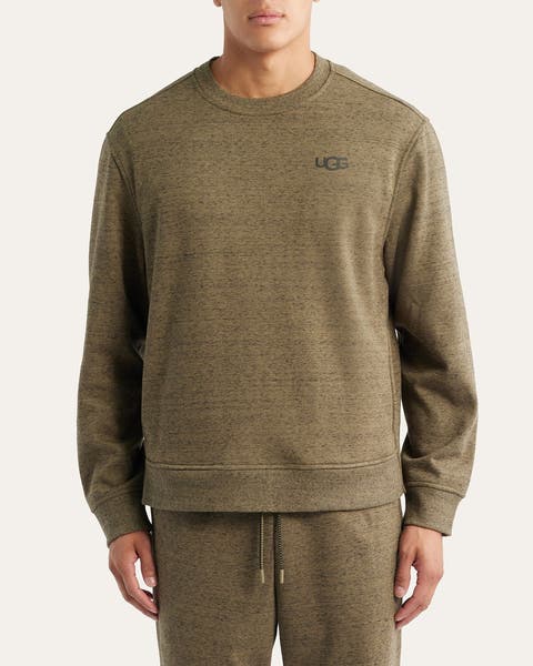 Image of man in green sweatshirt.