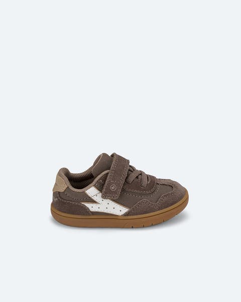 Brown and white suede baby sneakers.