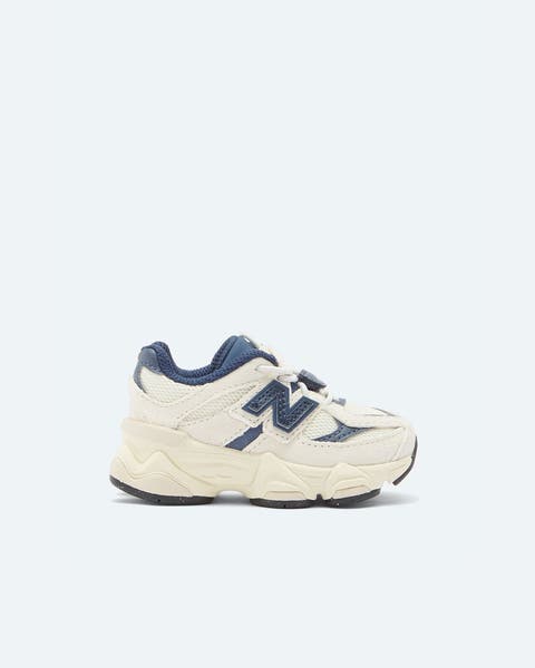 White and blue toddler sneakers.