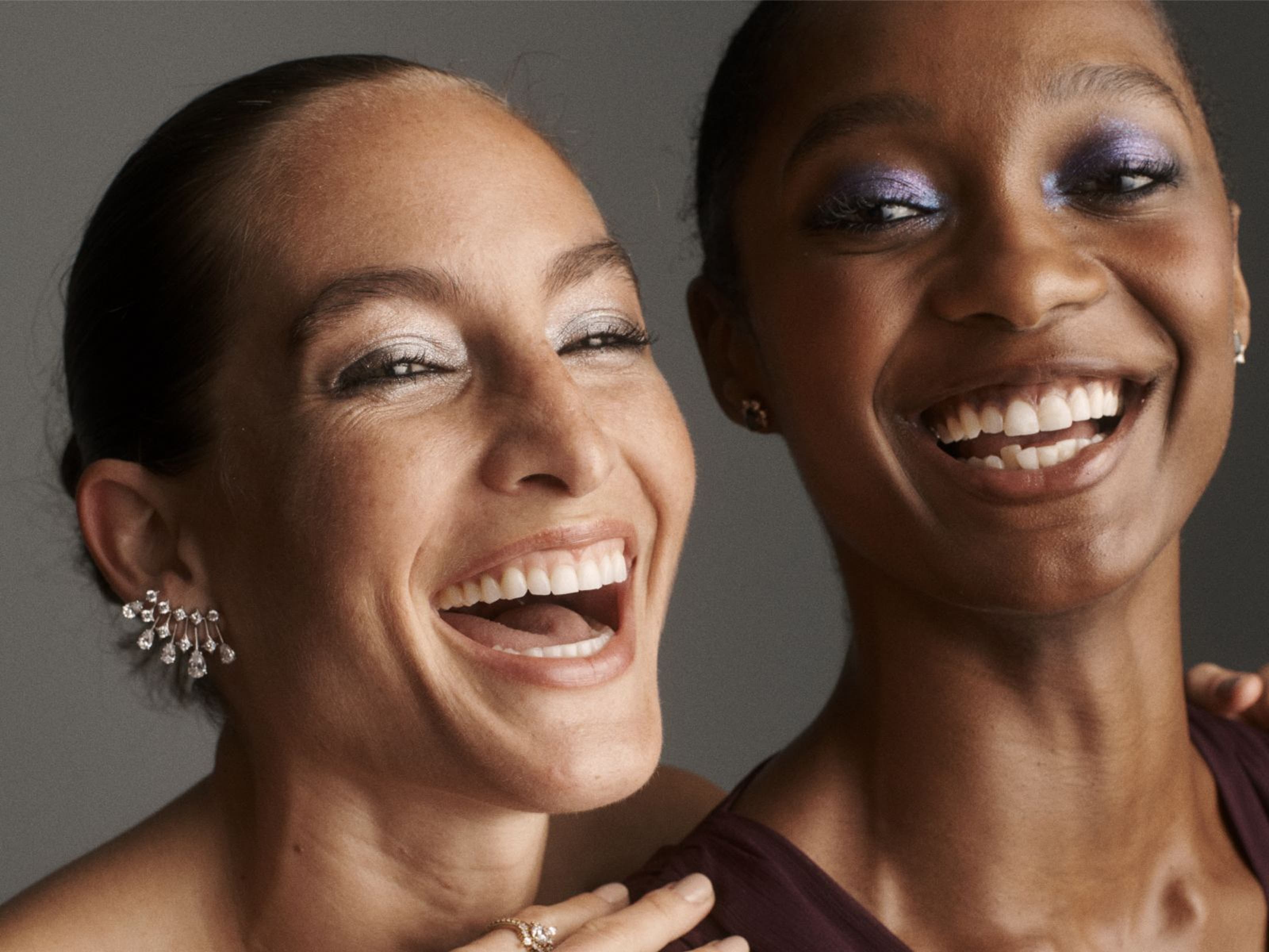Two women laughing. 