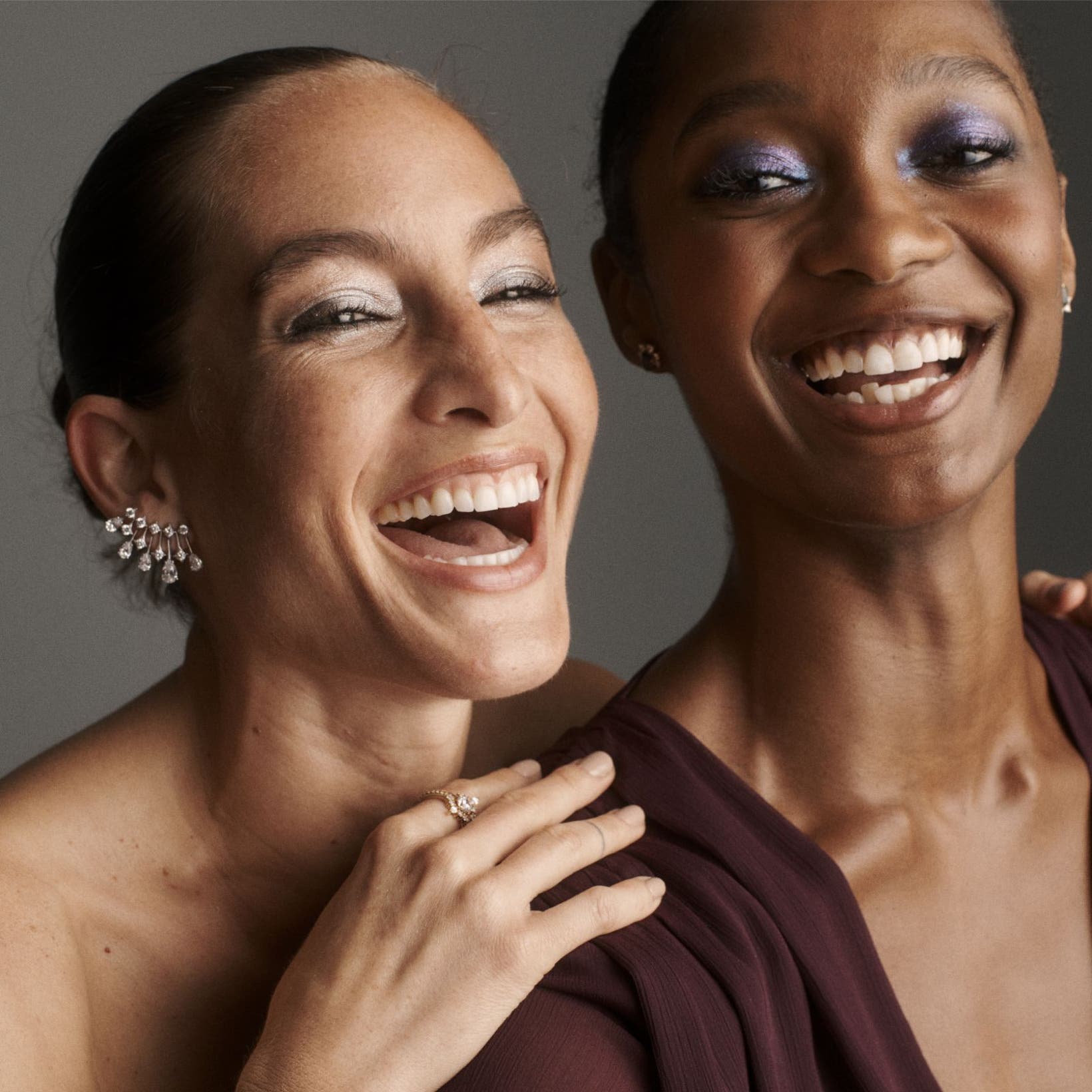 Two women laughing. 