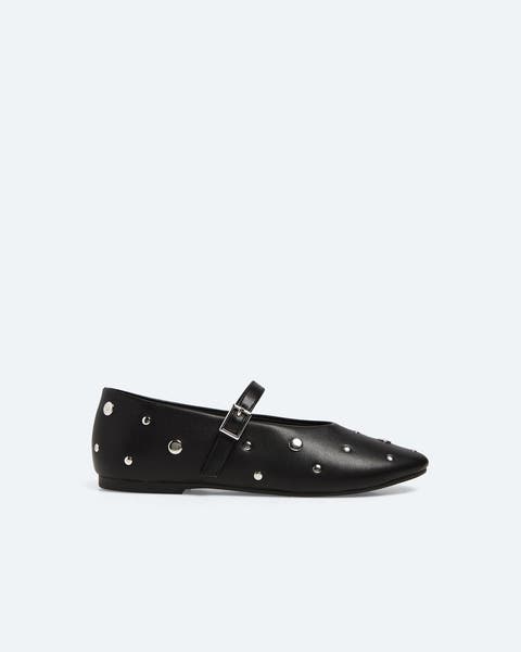 Black mary janes with stud details.