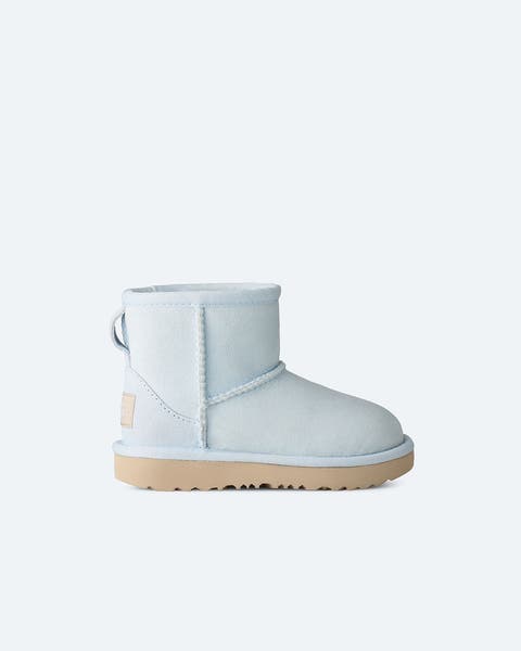 Powder blue ankle UGGs.