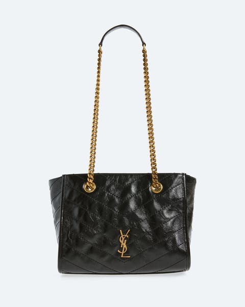 Black quilted leather shoulder bag with gold-tone chain-link straps and a gold YSL logo plaque on the front