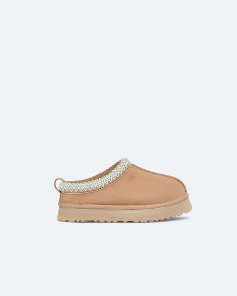 Tan suede UGGs.