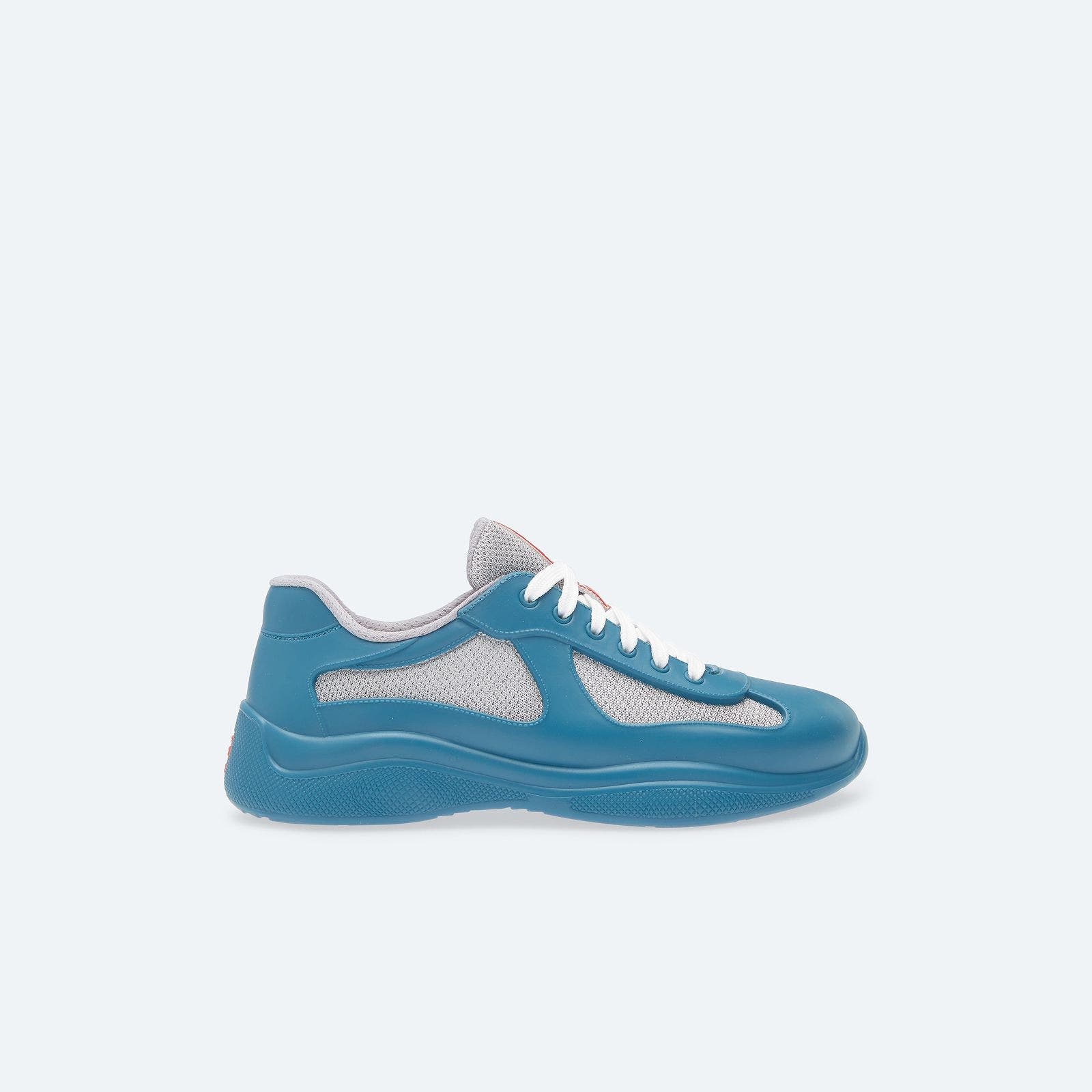 A sporty blue sneaker with mesh insets.