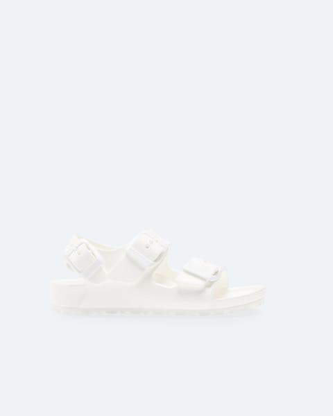 White sandals with buckle detail.