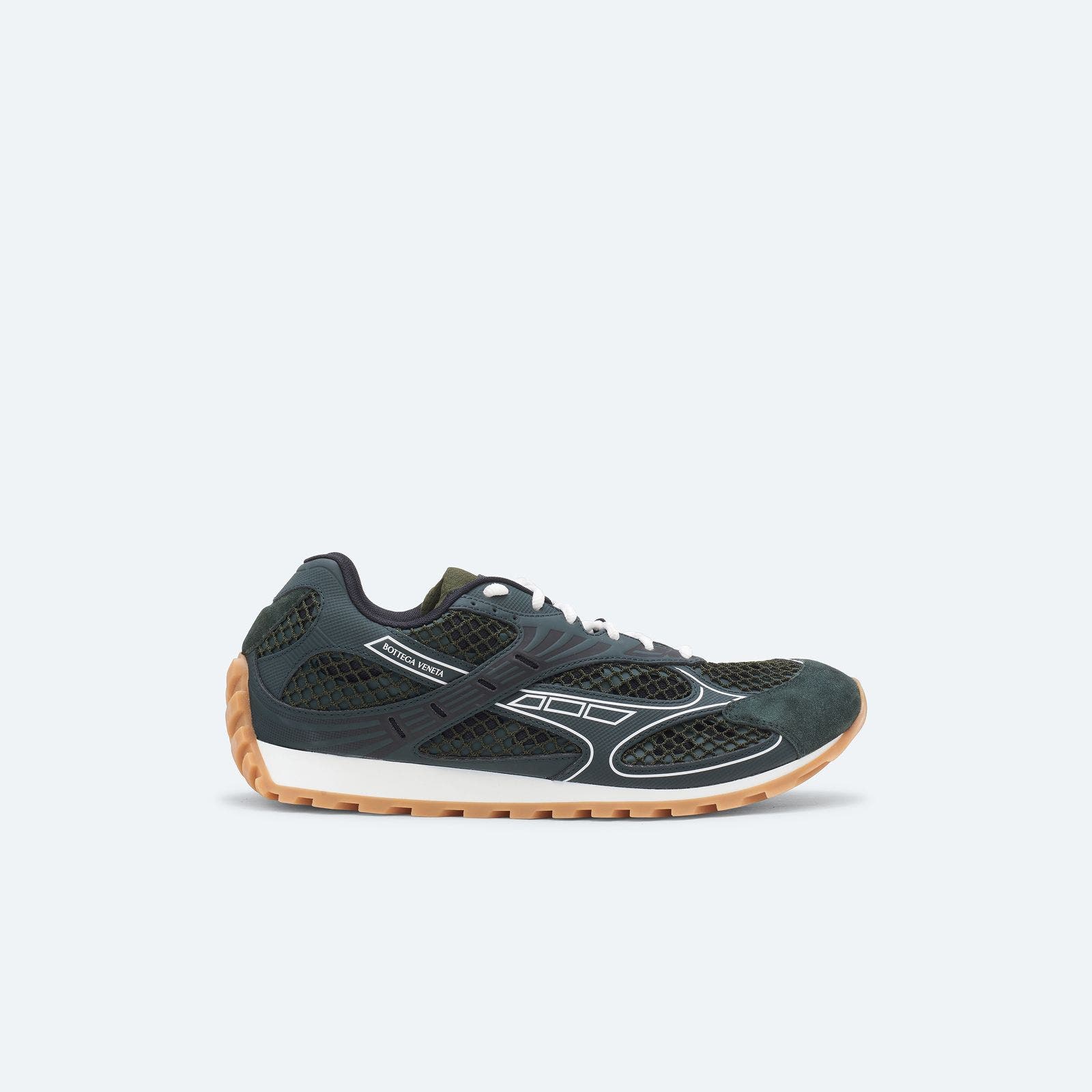 A dark-green low-top sneaker.