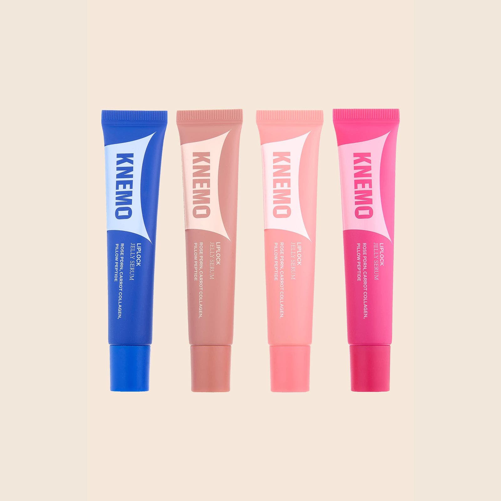 Four KNEMO lip tubes in blue, nude, peach and hot pink, lined up side by side.