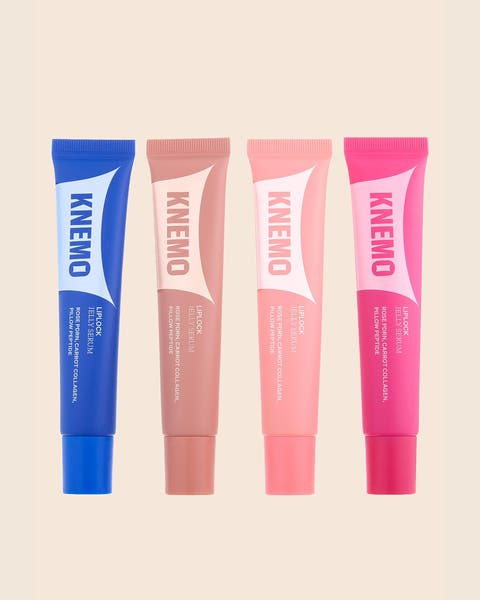 Four KNEMO lip tubes in blue, nude, peach and hot pink, lined up side by side.