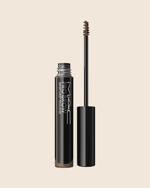 An open MAC Cosmetics brow product with a black cap and a bristled applicator wand.