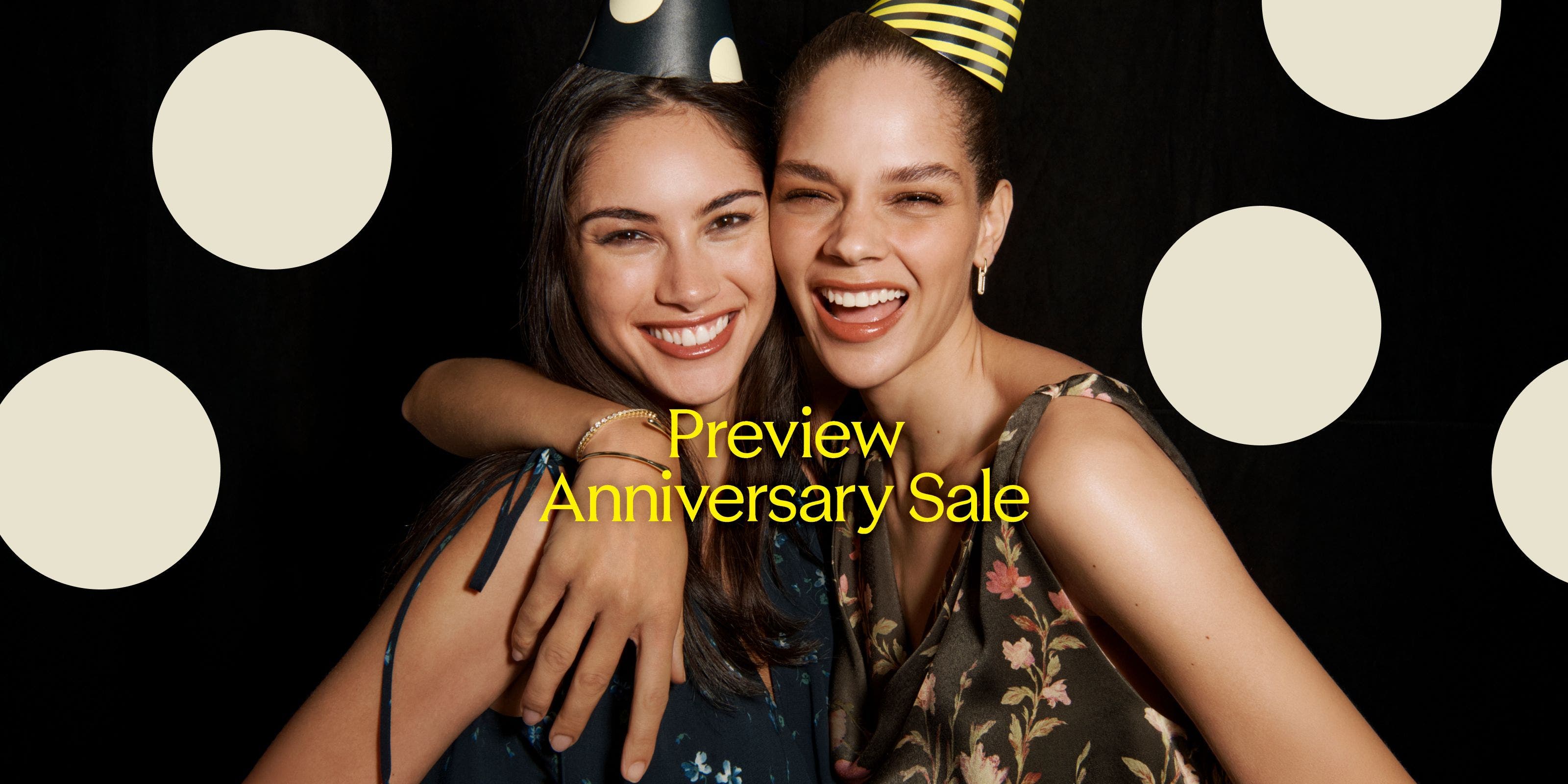 Preview Anniversary Sale: two laughing women in party hats.