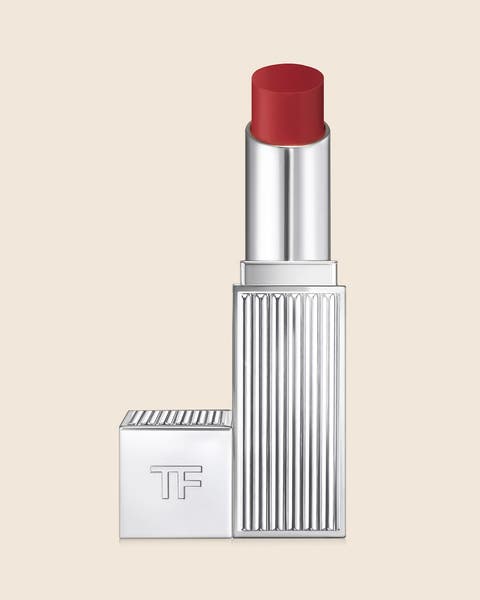 A TOM FORD lipstick in a silver ribbed case with a bold red bullet