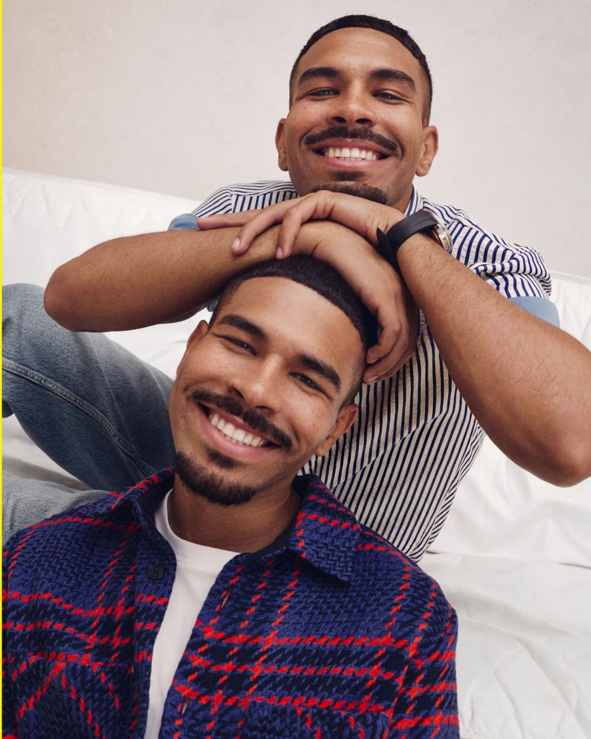 Two men in shirts on sale.