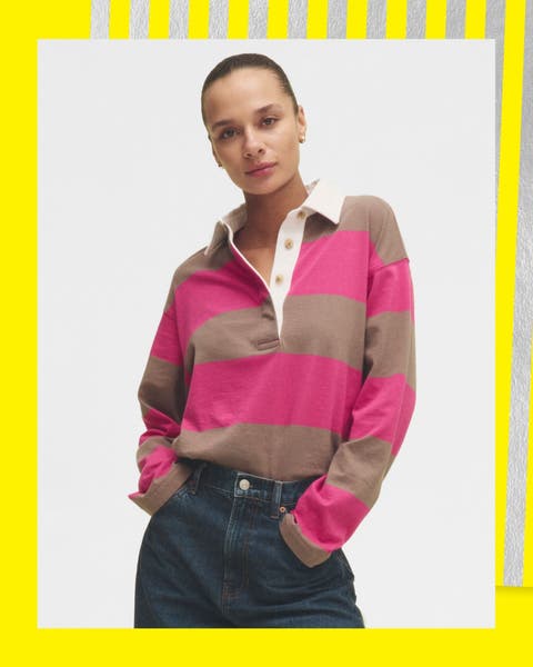 A woman wearing a striped polo shirt.