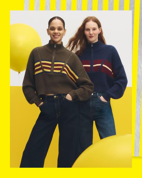Two women wearing sweaters.