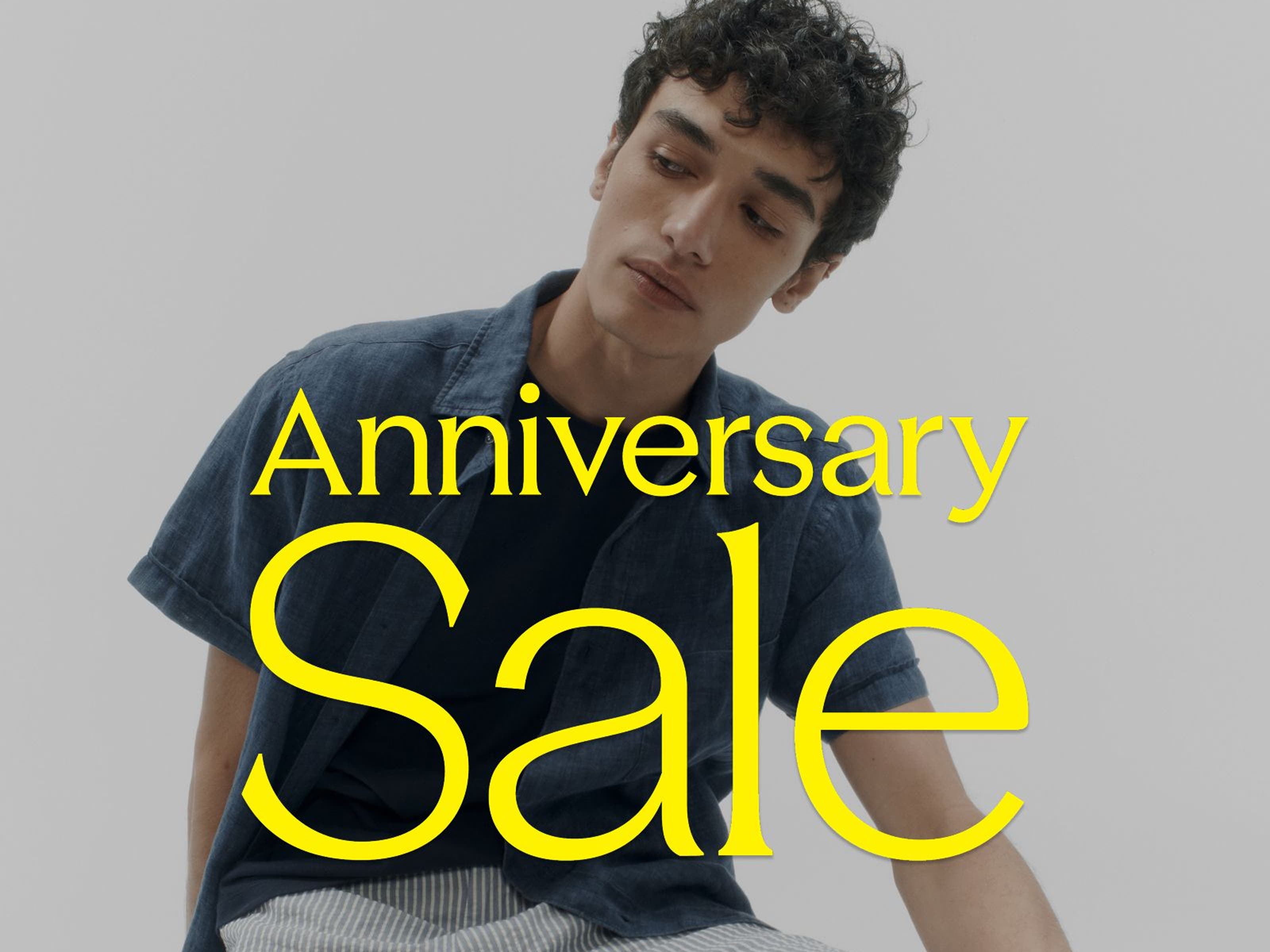 Anniversary Sale: a man in a short-sleeve button-up and shorts. 