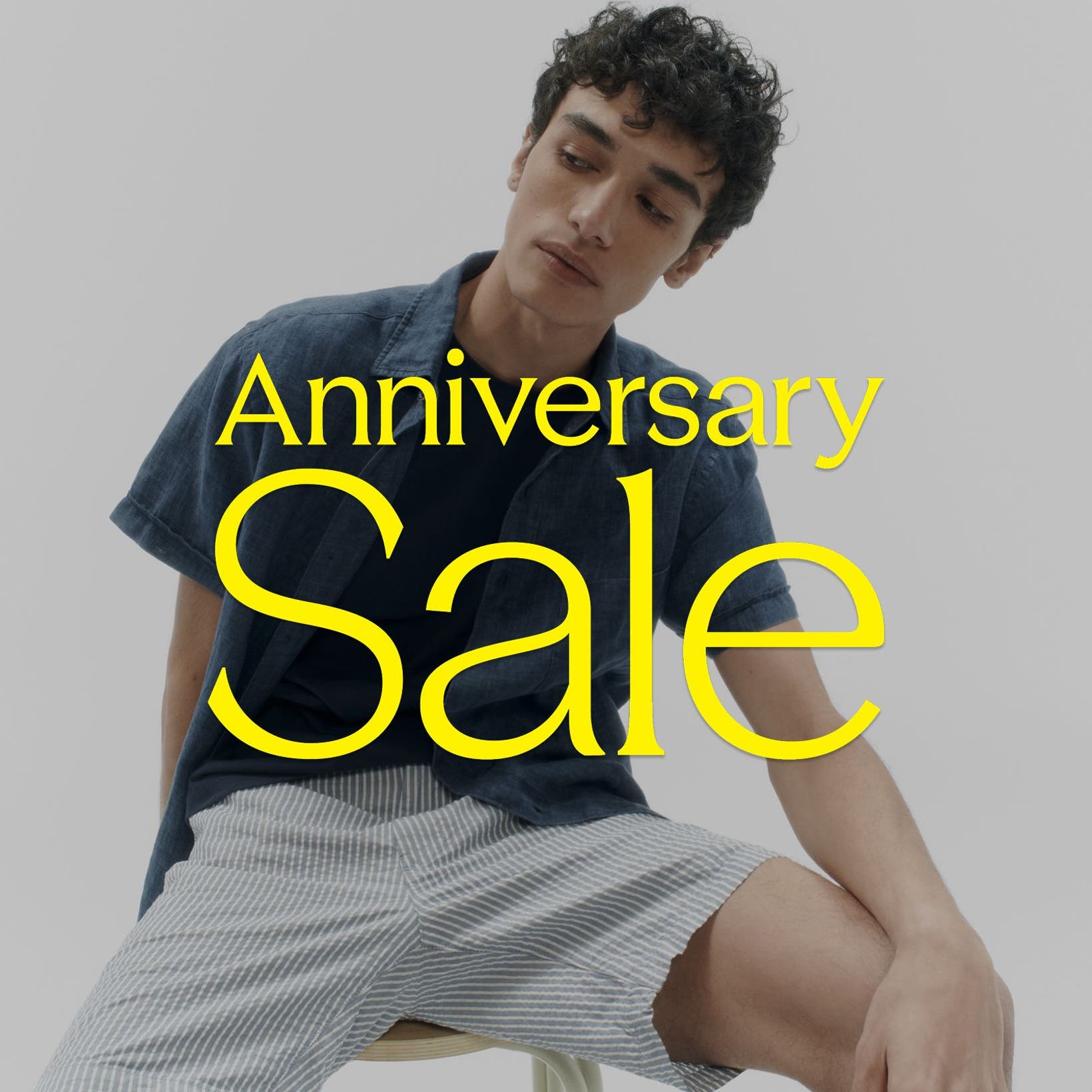 Anniversary Sale: a man in a short-sleeve button-up and shorts. 