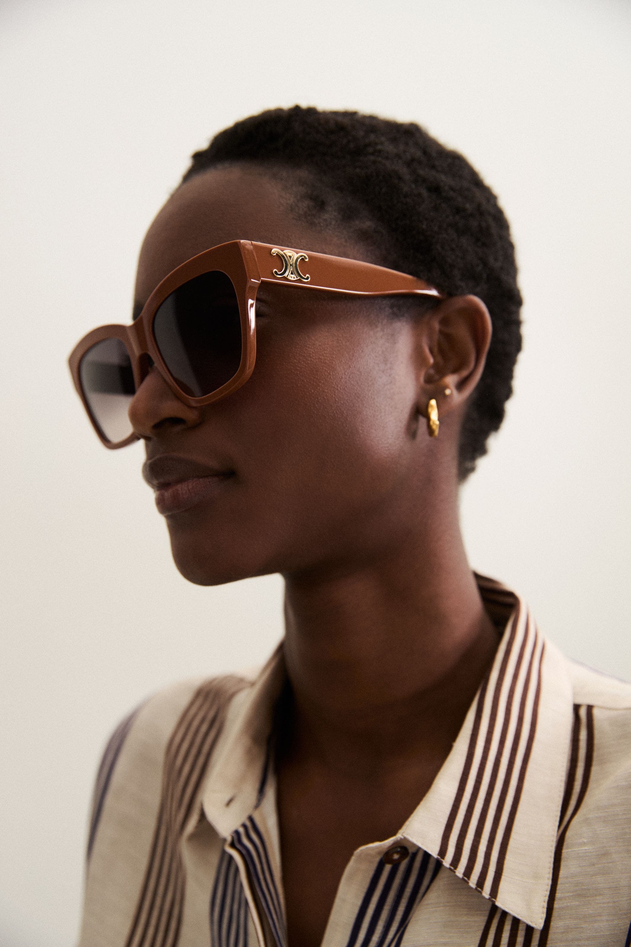 A woman wearing Celine sunglasses.