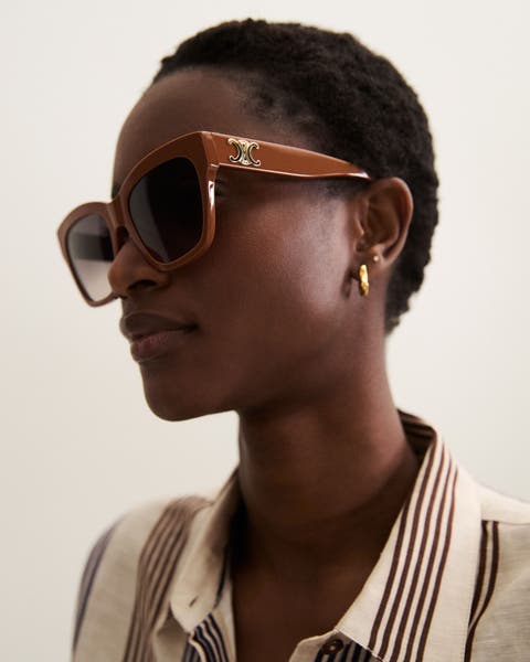 A woman wearing Celine sunglasses.
