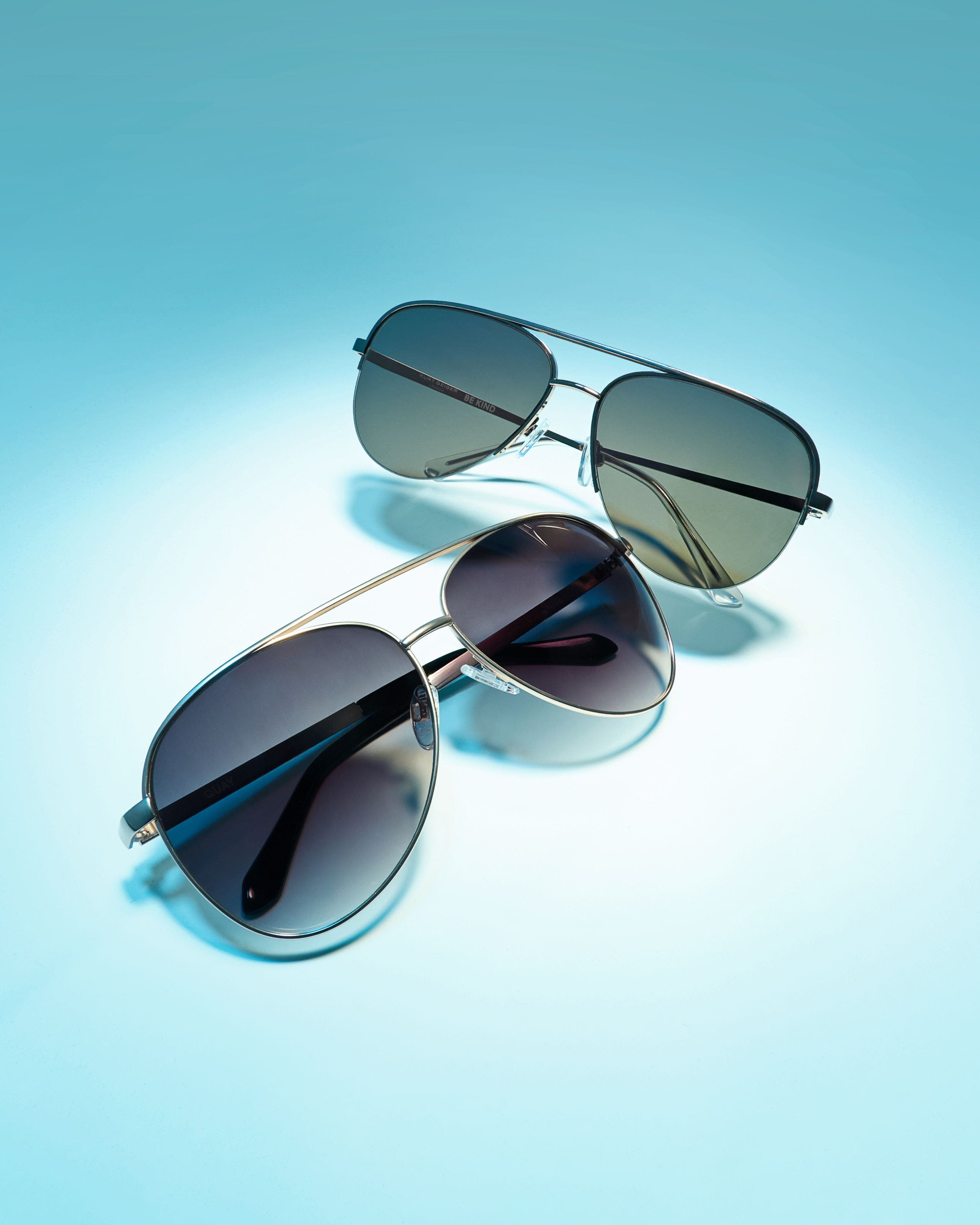 Two men's aviator sunglasses.