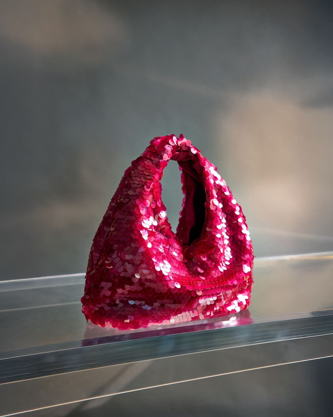 A red bag with sequins.