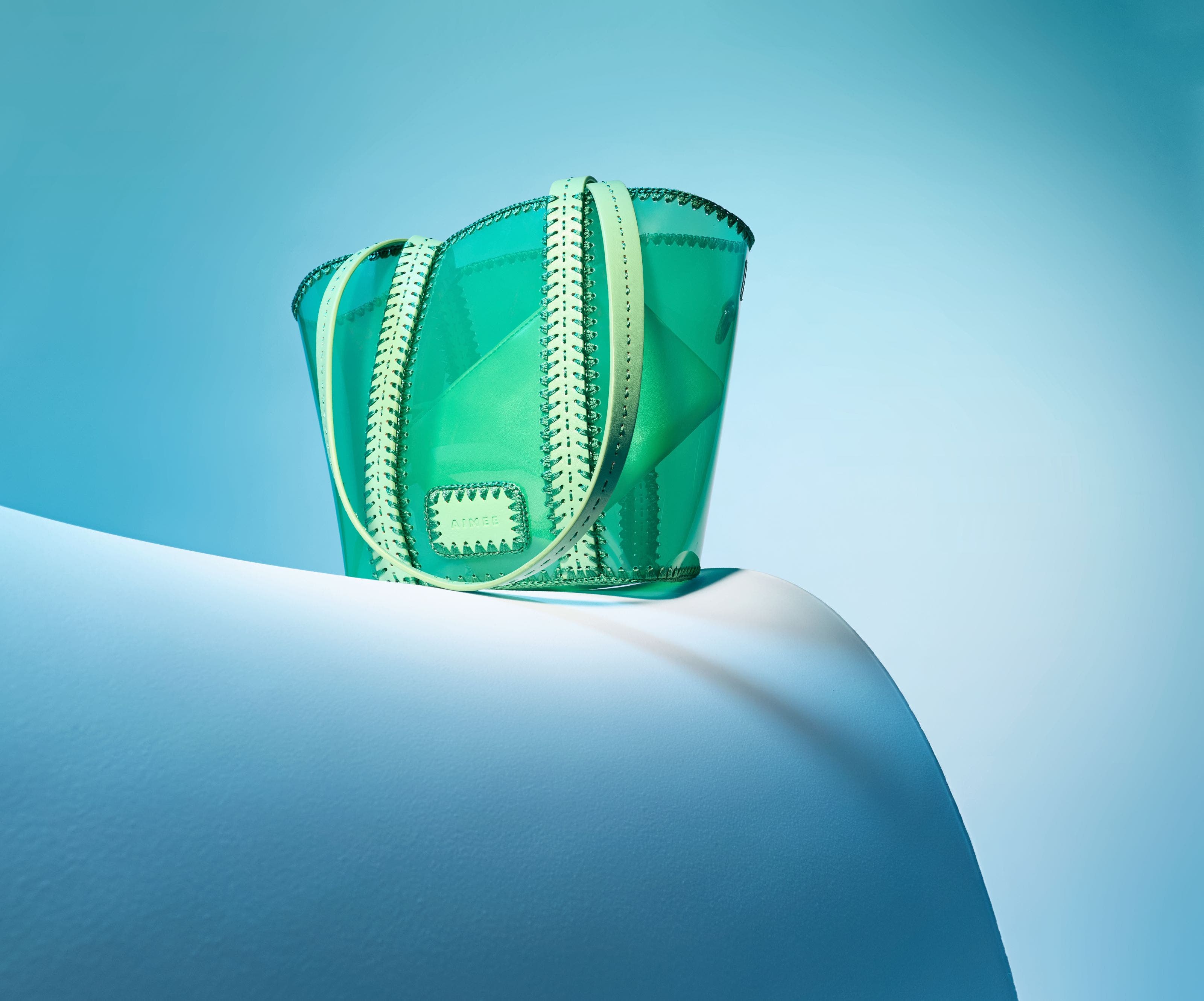 Photo of a green handbag. 