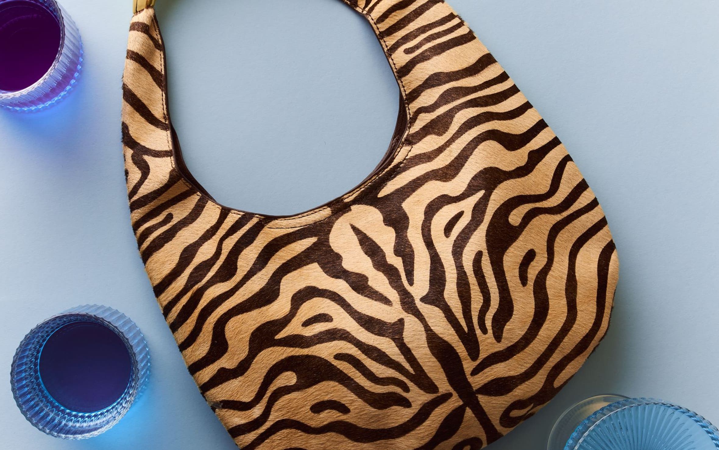 A ziger-print handbag.