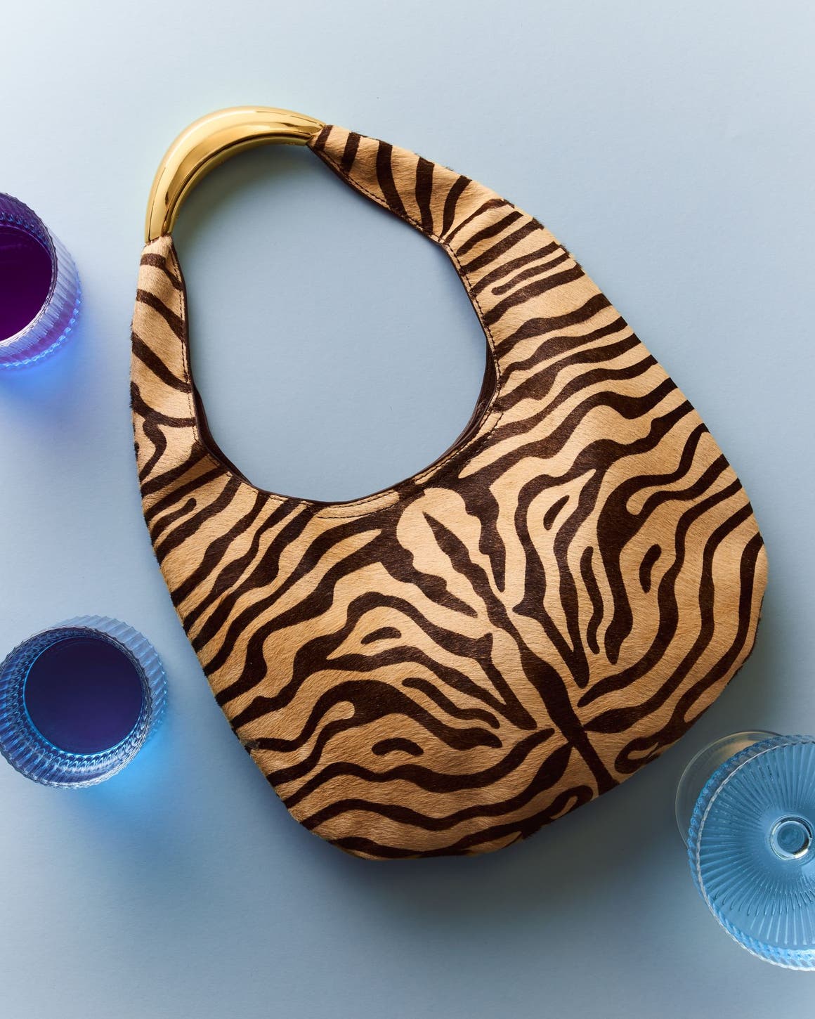A ziger-print handbag.