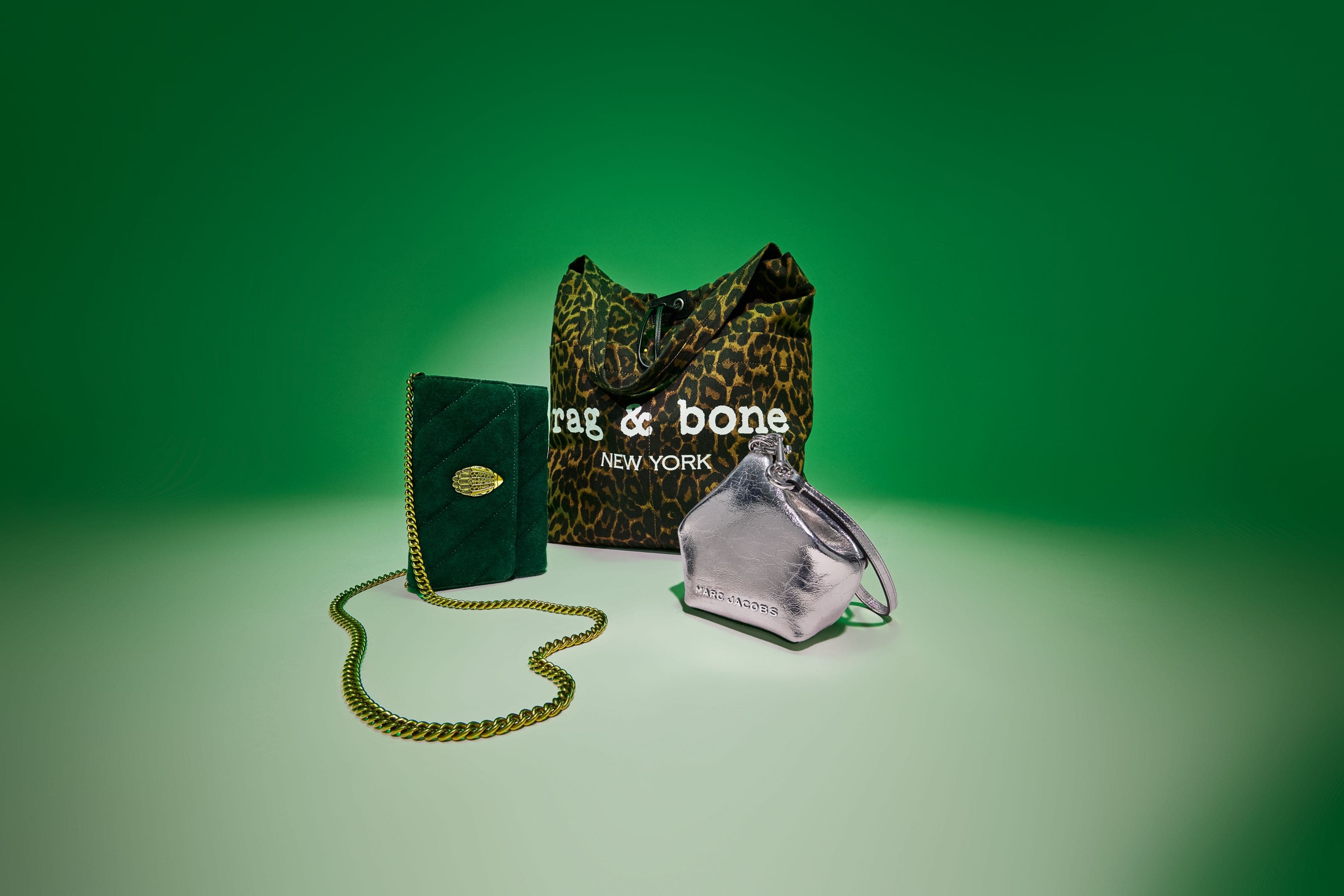 Leopard tote, green suede chain bag, and a silver mini bag.