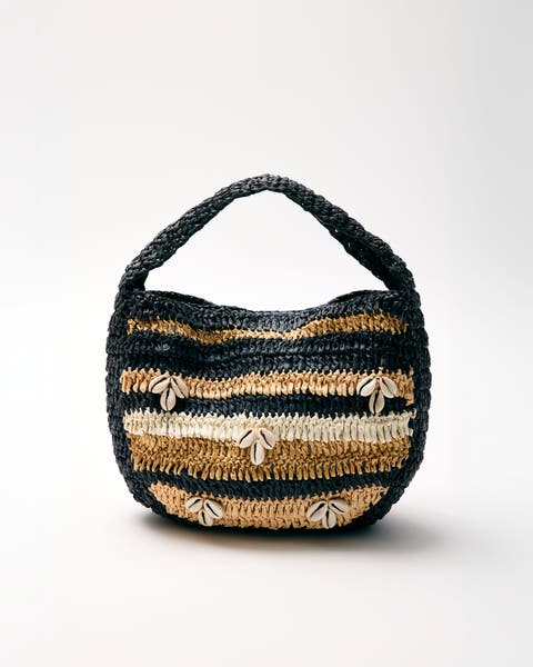 Woven handbag with shell details.