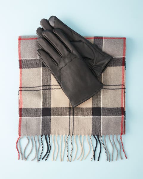 Leather gloves and a plaid scarf.