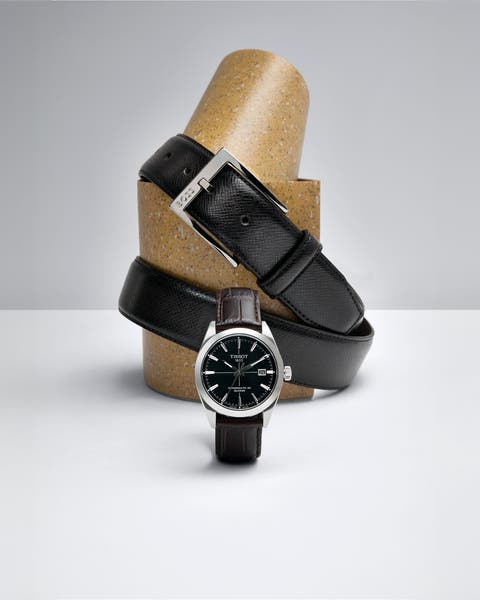 A black leather belt and watch.