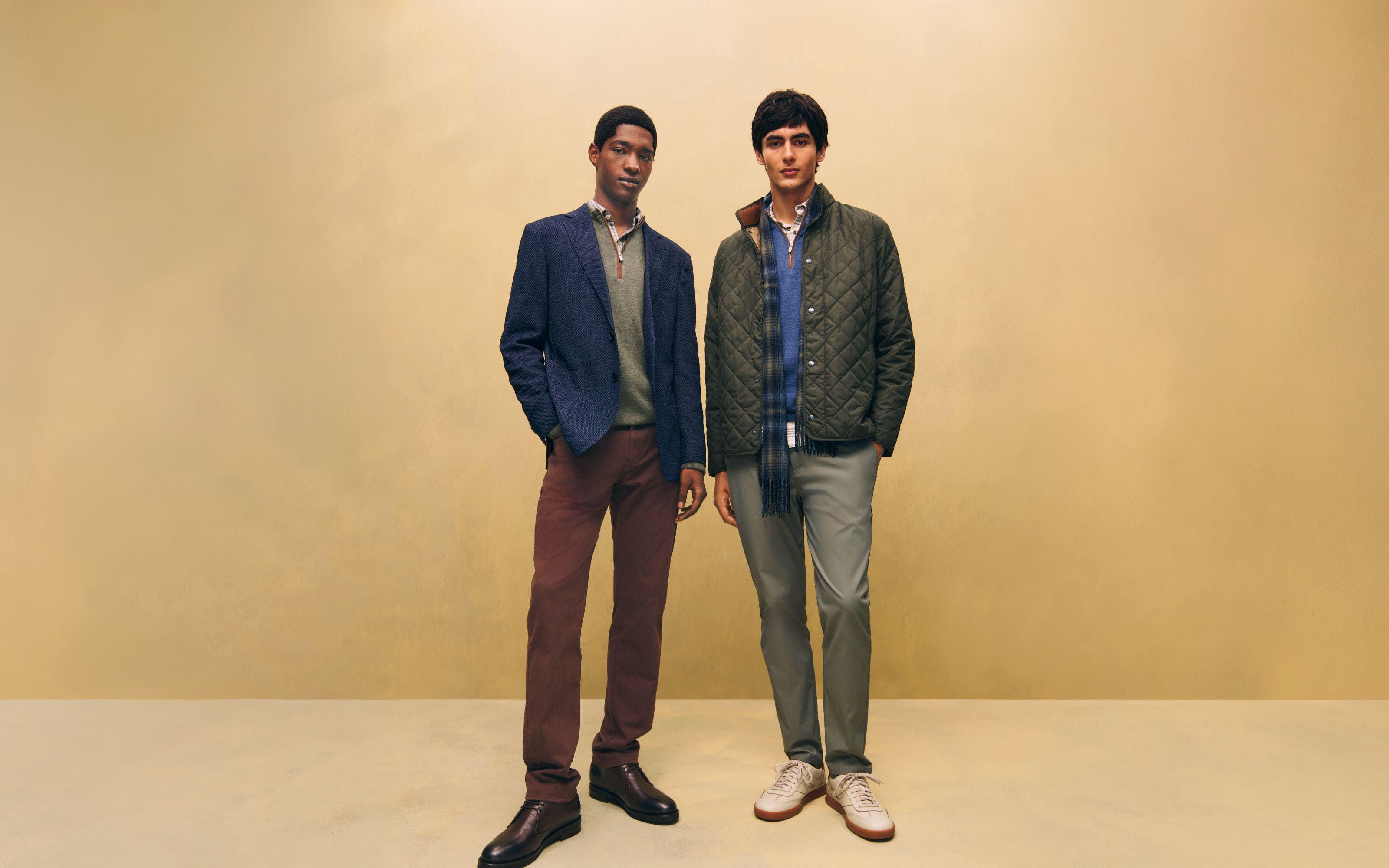 Two men in jackets and pants.