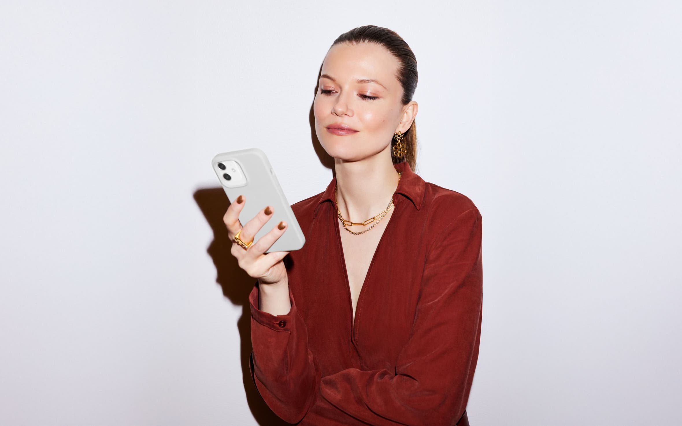 Woman looking at a cell phone.