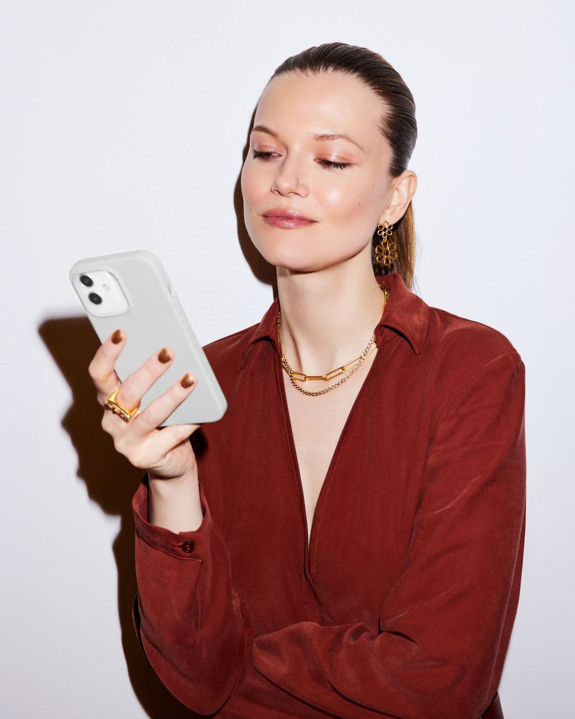 Woman looking at a cell phone.