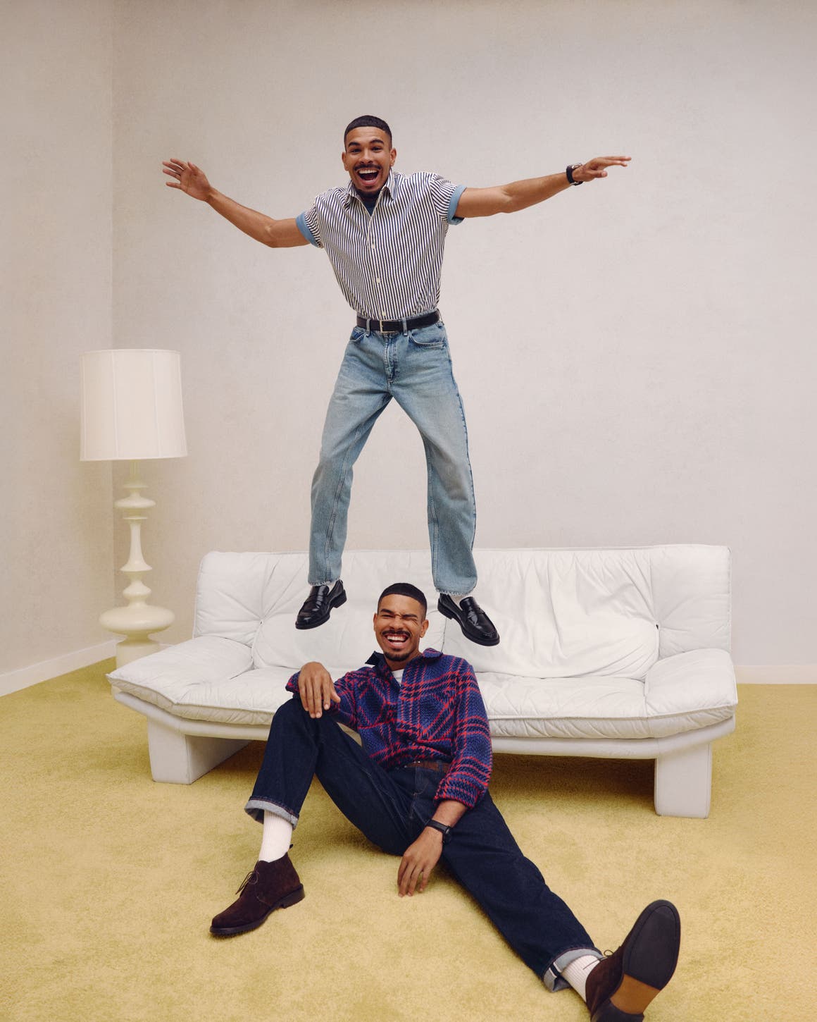 Two men wearing Anniversary Sale styles.